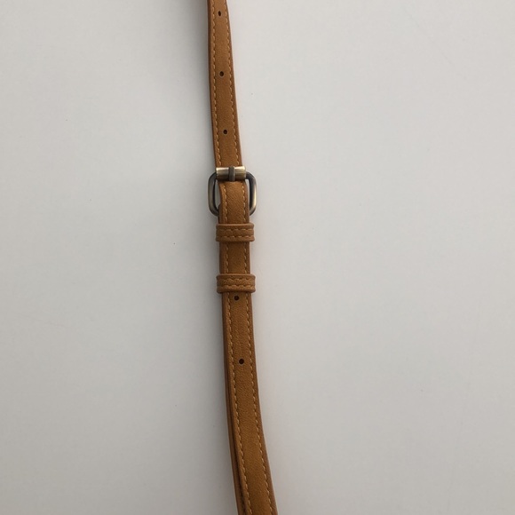 Cross body suede bag with adjustable strap and cute tassel detail. - Picture 2 of 6